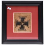 A section of silk with a 1939 Iron Cross woven, probably part of a car pennant, in an ebonised frame