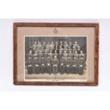 A framed group photograph of the graduating class at the “Metropolitan Police Training School,