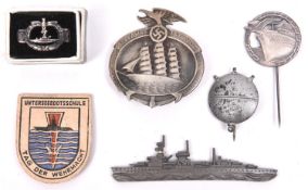 6 Third Reich items, Blockade Runners tiepin, U Boat silver ring, and 4 other items. GC (6) £40-50