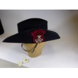 A black felt slouch hat of the Queen’s Own Oxfordshire Hussars, with narrow black silk edging to the