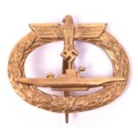 A Third Reich U Boat breast badge in gilt finish, stamped on reverse “FRIEDRICH KELLER OBERSTEIN” GC