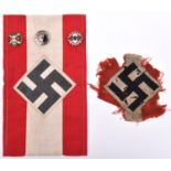A Third Reich Hitler Youth armband, Hitler Youth shooting badge, 2 other enamelled HJ badges and a