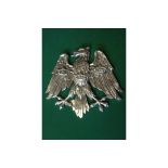 A polished cast aluminium heraldic spread eagle, with 3 crowns on its breast and wings, as used by