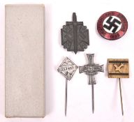 A Third Reich Party badge, a Kreta tiepin, a Stalingrad tie pin and 2 other items. GC (5) £40-50