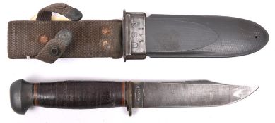 A WWII US Navy Mk 1 general purpose/fighting knife, by PAL, the blade marked “U.S.N. MARK 1”, with