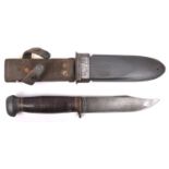 A WWII US Navy Mk 1 general purpose/fighting knife, by PAL, the blade marked “U.S.N. MARK 1”, with