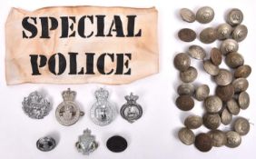 33 Nottinghamshire Constabulary KC large WM tunic buttons; 4 police cap badges and 4 other items. GC