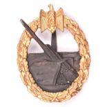 A Third Reich Coastal Artillery badge, gilt and bronzed finish. VGC £50-80