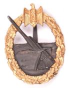 A Third Reich Coastal Artillery badge, gilt and bronzed finish. VGC £50-80