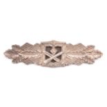 A Third Reich Close Combat clasp, silvered 30 Day finish, marked on reverse “FEC. W.E. PEEKHAUS