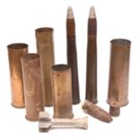 A quantity of WWII shell cases comprising: 2 Drill rounds with brass cases and drill heads; a 1941