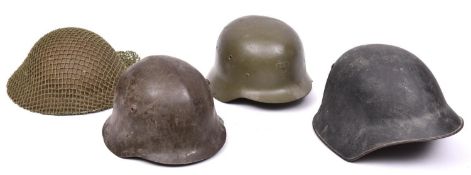 A Spanish steel helmet; a WWII British helmet, lining and chinstrap missing; 2 other continental