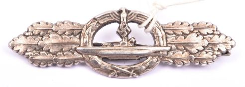 A Third Reich U Boat breast badge, silvered finish, marked on reverse”ENTWURF PEEKHAUS AUSF SCHWERIN