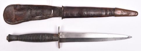 A Third Pattern FS military knife, with no visible markings, in its sheath. Basically GC (some