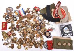 A small quantity of British military insignia, mostly post WWII, including pairs of officers’ slip