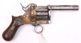 A 6 shot 10mm (?) provincially made brass framed double action ring trigger pinfire revolver,