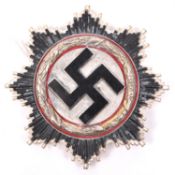 A Third Reich German Cross in silver, silver bronze and enamel finish, pin stamped “1”, VGC £350-450