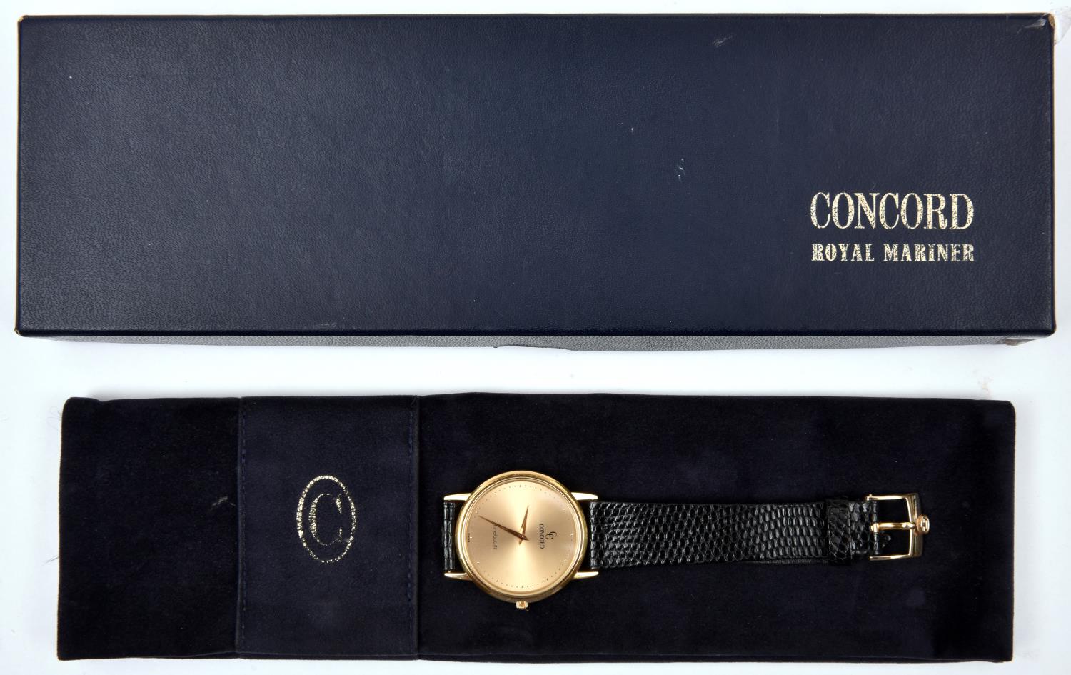 A Concord Nine Quartz watch with quartz movement 18ct gold case and face and black leather strap.