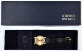 A Concord Nine Quartz watch with quartz movement 18ct gold case and face and black leather strap.