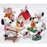 10 Ceramic Snoopy figures. Charlie Brown with Snoopy. Snoopy lying on kennel. Snoopy & Woodstock
