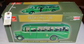 A Sunstar 1:24 scale Bedford OB Duple Vista Coach. In King Alfred Omnibus Company Ltd green