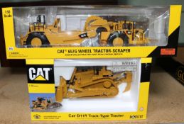 2 Norscot Heavy Plant items. A CAT D11R Track-Type Tractor. Together with a CAT 657G Wheel Tractor-