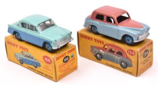 2 Dinky Toys. Hillman Minx Saloon (154). An example in pink and light blue with mid blue wheels