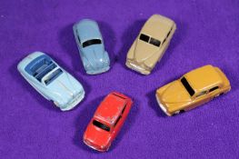 5x Dinky Toys cars. Standard Vanguard (40e) with fawn body and wheels. Hillman Minx (40f) in