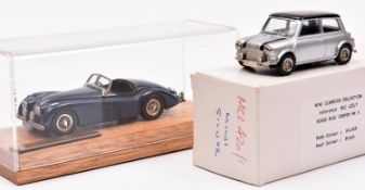 2 white metal 1:43 models. A Mini Classics Collection Rover Mini Cooper Mk4. An example in