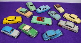 12x Dinky Toys cars. Packard (132) in green with red interior. Triumph 1800 (151) in light blue.
