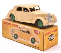 Dinky Toys Riley Saloon (158). An example in cream with mid green wheels and black tyres. Boxed,
