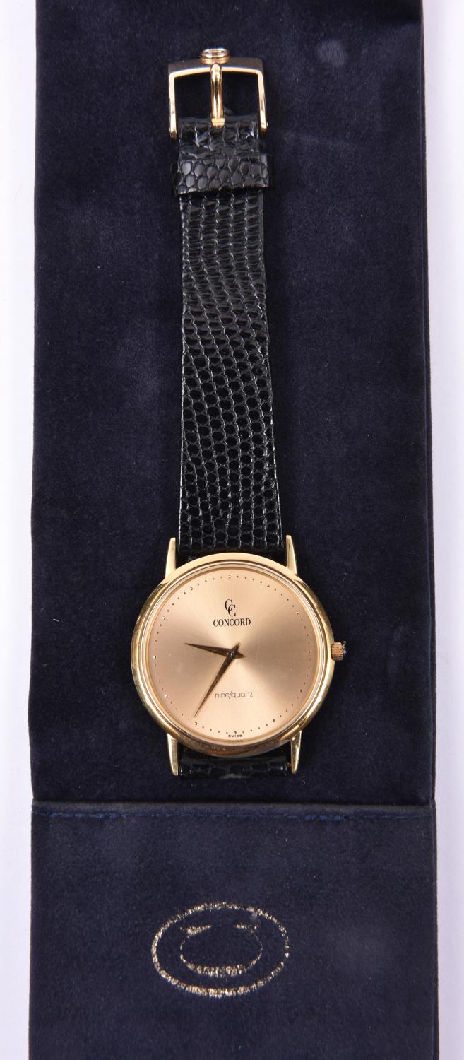 A Concord Nine Quartz watch with quartz movement 18ct gold case and face and black leather strap. - Image 2 of 2