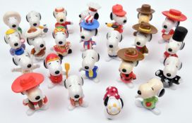 50 McDonalds Peanuts Snoopy Characters. Examples include- Snoopy as a Mexican, Viking, RCMP,