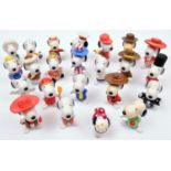 50 McDonalds Peanuts Snoopy Characters. Examples include- Snoopy as a Mexican, Viking, RCMP,