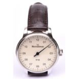 A MeisterSinger No.2 watch with manual winding movement. Stainless steel case, a cream face with