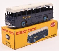 Dinky Toys B.O.A.C. Coach (283). In dark blue an white livery, with mid blue wheels and black smooth