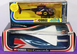 2 Corgi. A Batcopter (925). In black with orange/black blades. Complete. Boxed, some creasing to