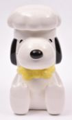 A large ceramic Snoopy Cookie Jar. Two piece item with Chefs hat lift off lid. 18cm high. VGC £30-50