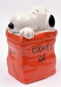 Vintage Ceramic Snoopy Cookie Bag. A money box in the shape of a cookie bag with Snoopy residing