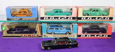 7 Russian made 1:43 Vehicles. 2x Volga - 1 green & 1 black. Volga Taxi in green. Volga airport '