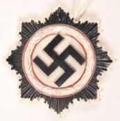 A Third Reich German cross in silver, pin marked “1”. VGC £150-180.