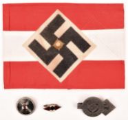 A Third Reich Hitler Youth Proficiency badge in silver coloured metal, numbered 44551, “RZM” etc