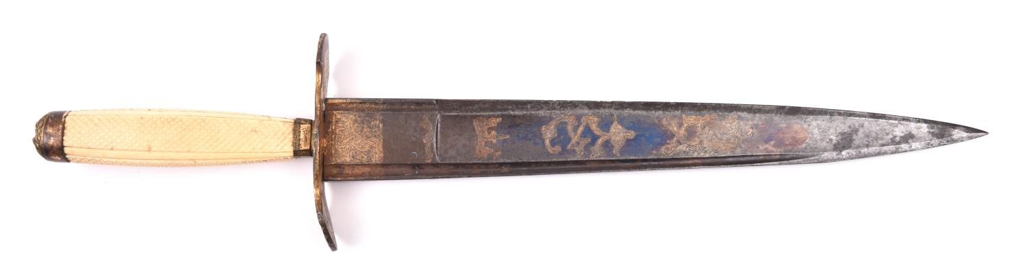 A Georgian naval dirk, broad SE blade 10¾” with etched, blued and gilt decoration, gilt copper