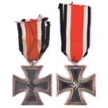 A 1939 Iron Cross 2nd Class with ribbon, GC; and another similar (one side rusted). £70-80.