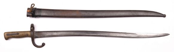 A French M1866 Chassepot bayonet, the blade engraved “Mre Rle de Chatt. Juillet 1871”, in its