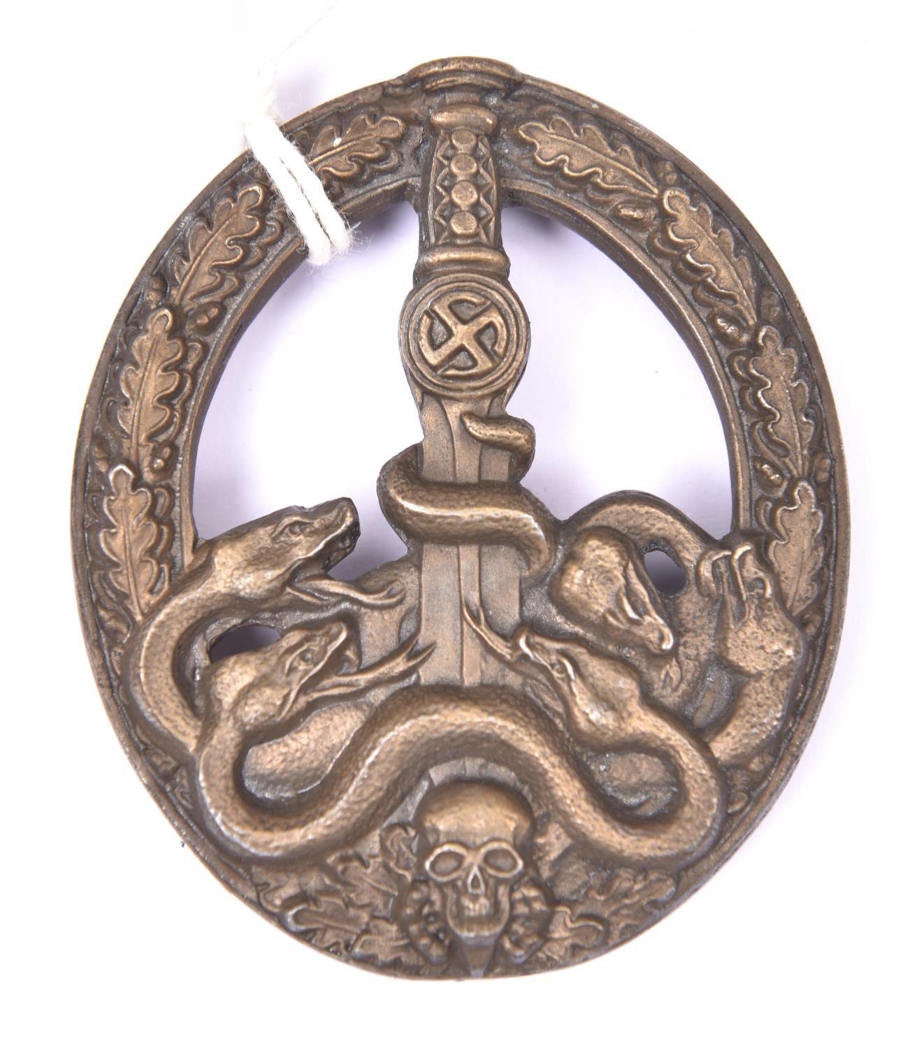 A Third Reich Anti Partisan badge, with hollow back, round pin, two pierced holes, and high relief