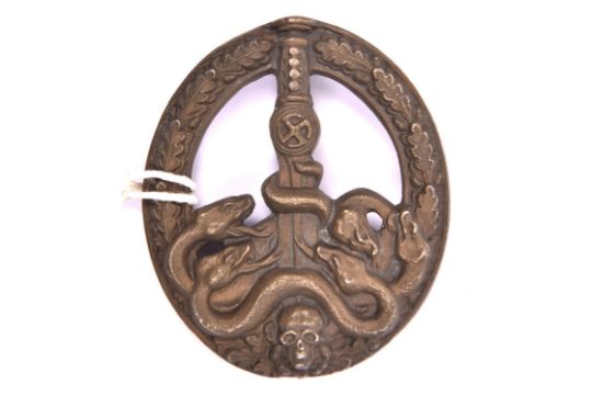 A scarce Third Reich Guerilla Warfare breast badge, bronzed finish. VGC £150-200