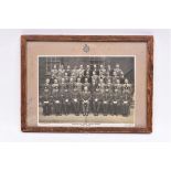 A framed group photograph of the graduating class at the “Metropolitan Police Training School,