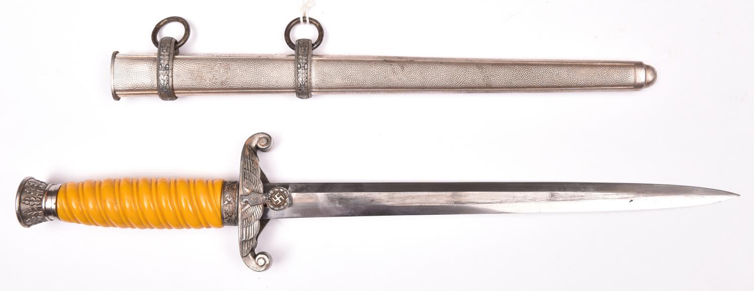 A Third Reich Army officer’s dagger, with plain unmarked blade, plated grey metal hilt and dark