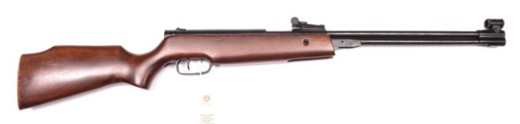 A .22” SMK XS 36-1 underlever air rifle, no visible serial number, with stained beech stock. GWO &
